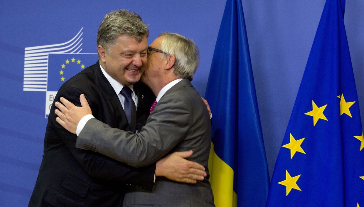 Президент Украины Петр Порошенко и президент Европейской Комиссии Жан-Клод Юнкер