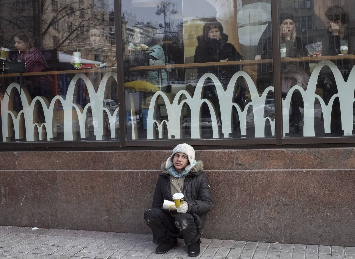 Попрошайка в центре Киева