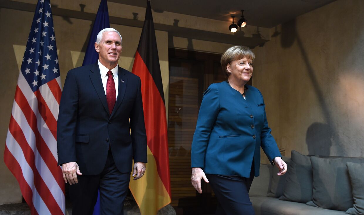 Вице-президент США Майкл Пенс и канцлер Германии Ангела Меркель