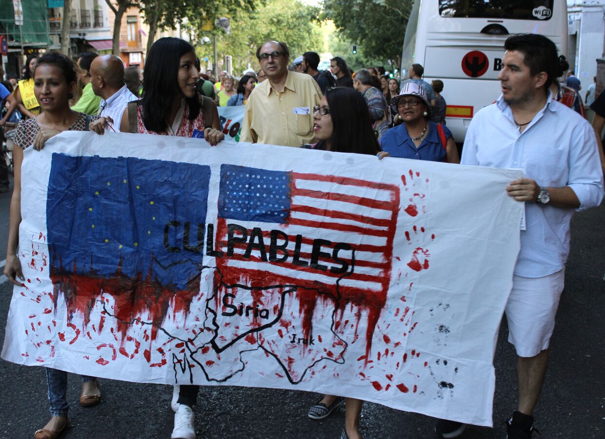 Участники митинга вышли на улицы испанской столицы, обвиняя США в возникшем хаосе на Ближнем Востоке