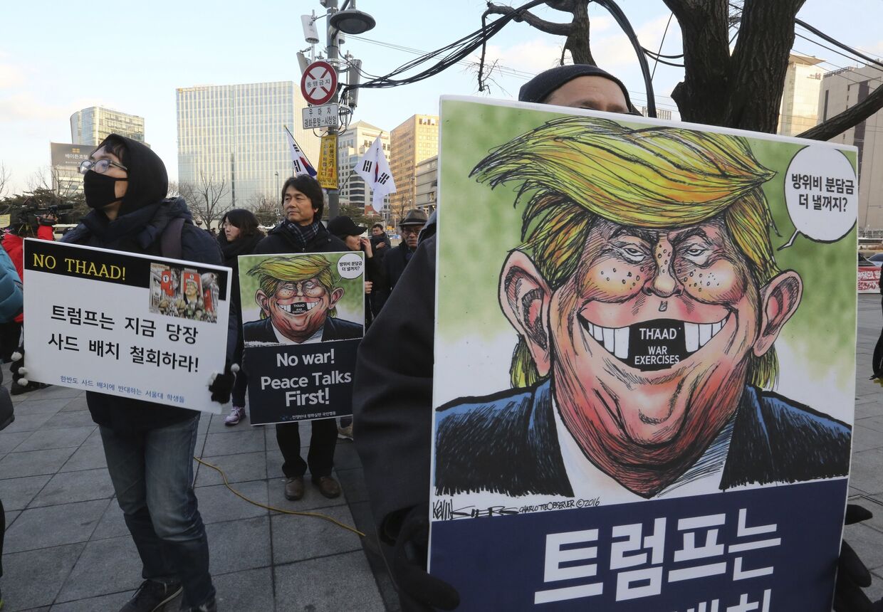 Акция протеста против системы THAAD в Сеуле