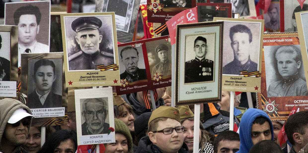 Шествие «Бессмертного полка» по Тверской улице в Москве Шествие «Бессмертного полка» по Тверской улице в Москве