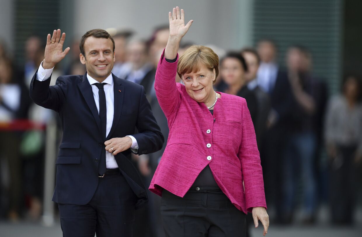 Канцлер Германии Ангела Меркель и президент Франции Эммануэль Макрон в Берлине