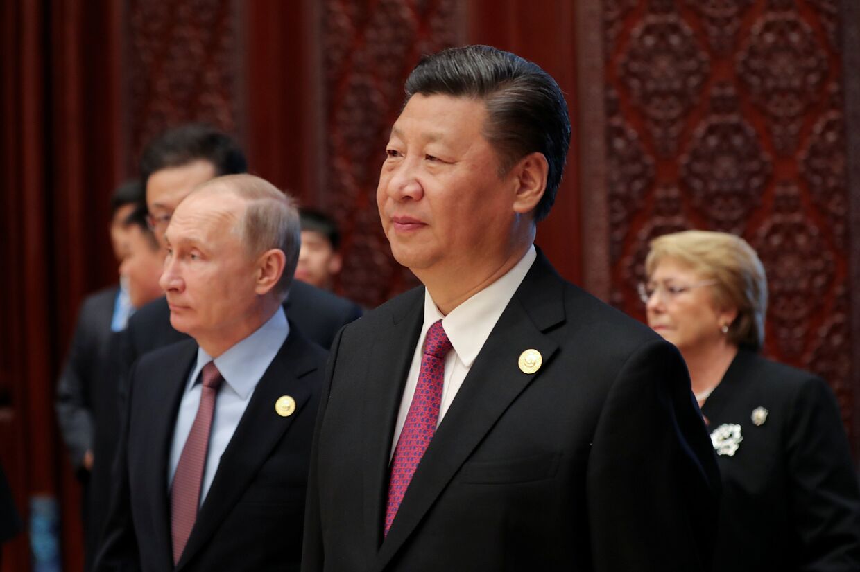 Президент России Владимир Путин и председатель КНР Си Цзиньпин на форуме «Один пояс, один путь» в Пекине