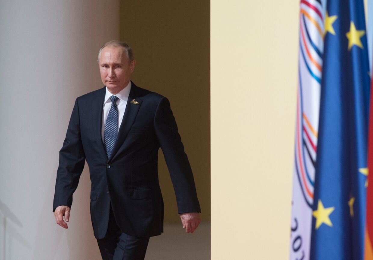 Президент РФ Владимир Путин принимает участие в саммите Группы двадцати в Гамбурге. 7 июля 2017