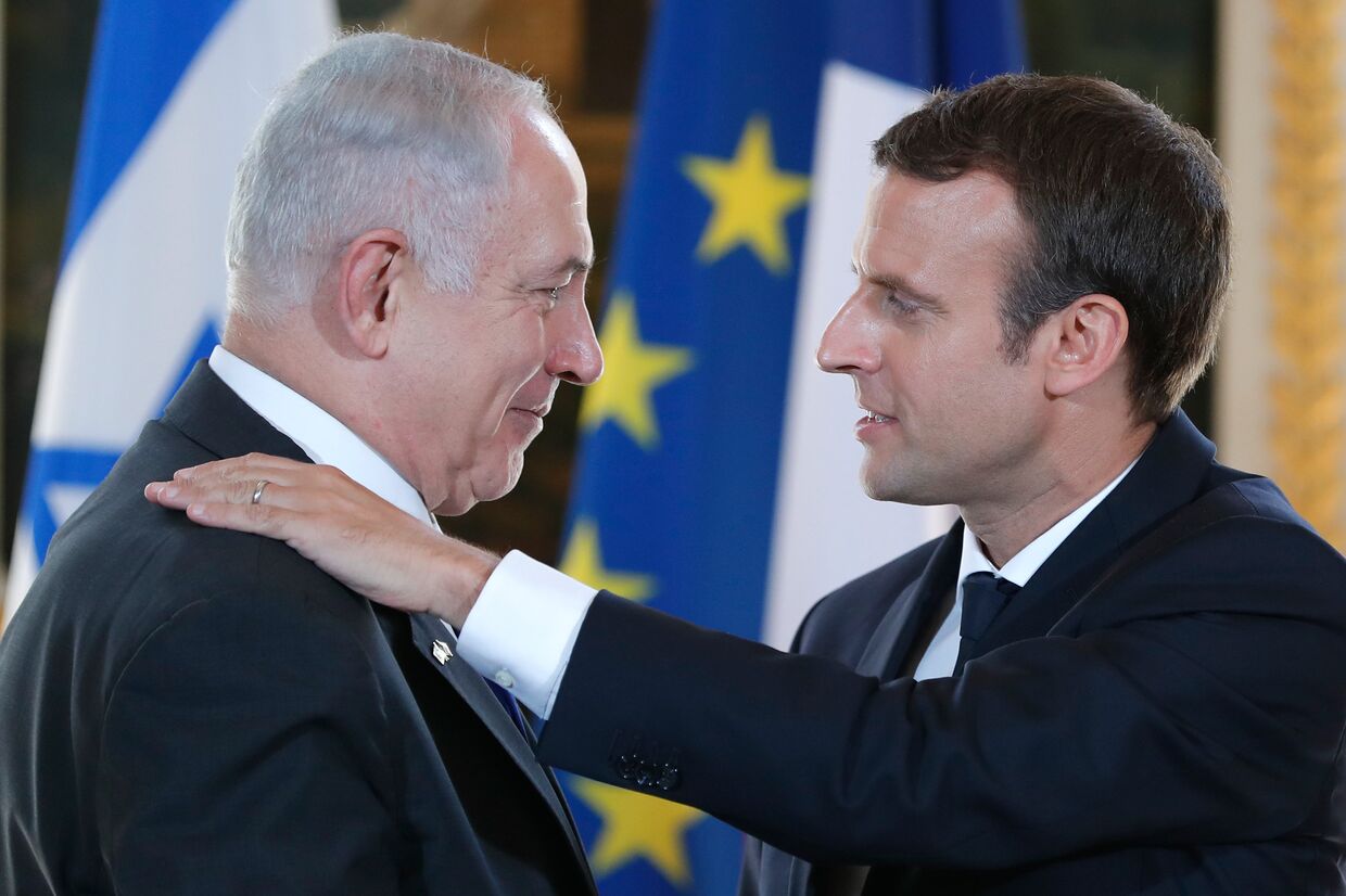 Премьер-министр Израиля Биньямин Нетаньяху и президент Франции Эммануэль Макрон
