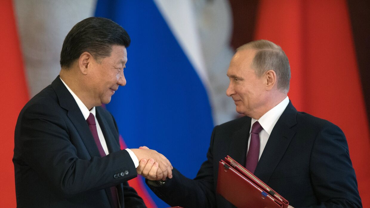 Президент РФ Владимир Путин и председатель Китайской Народной Республики (КНР) Си Цзиньпин