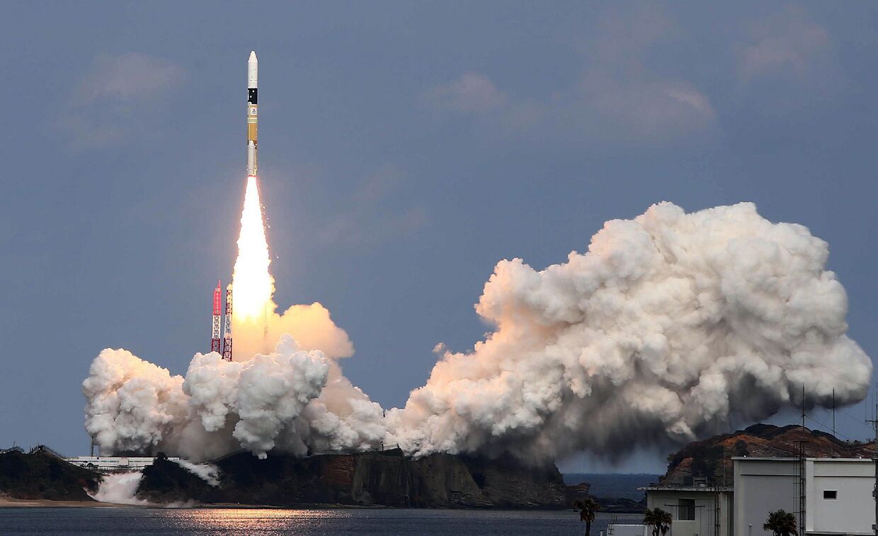 Японская ракета H-IIA взлетает в японском агентстве аэрокосмических исследований