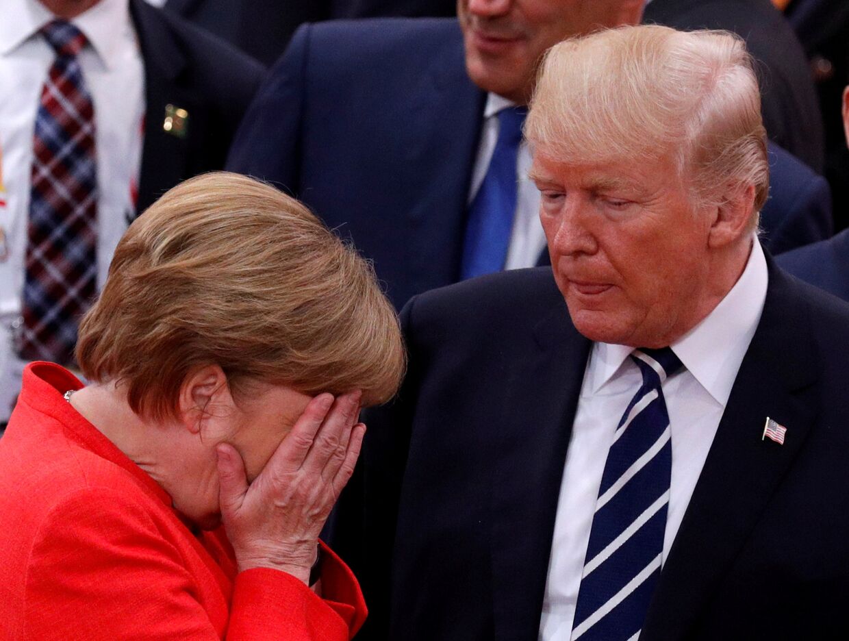 Канцлер Германии Ангела Меркель и президент США Дональд Трамп в ходе саммита G20 в Гамбурге