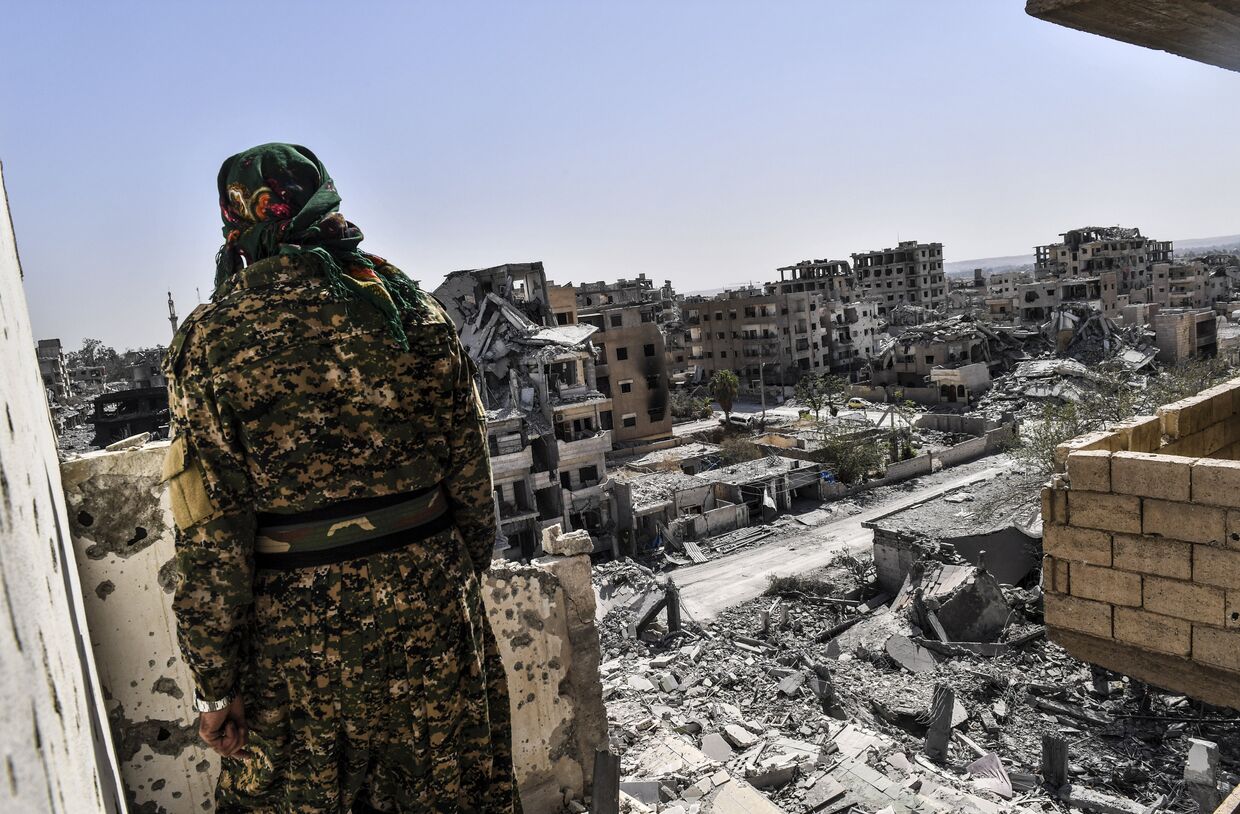 Боец Сирийских демократических сил в Ракке, Сирия