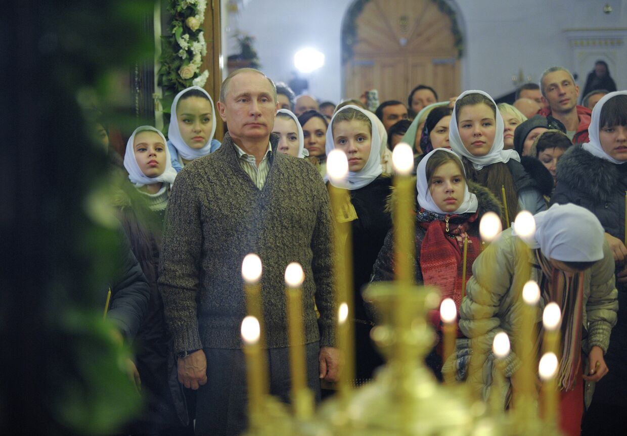 Президент России Владимир Путин во время Рождественского богослужения