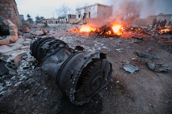 Обломки сбитого боевиками российского самолета Су-25 в Сирии. 3 февраля 2018 Обломки сбитого боевиками российского самолета Су-25 в Сирии. 3 февраля 2018