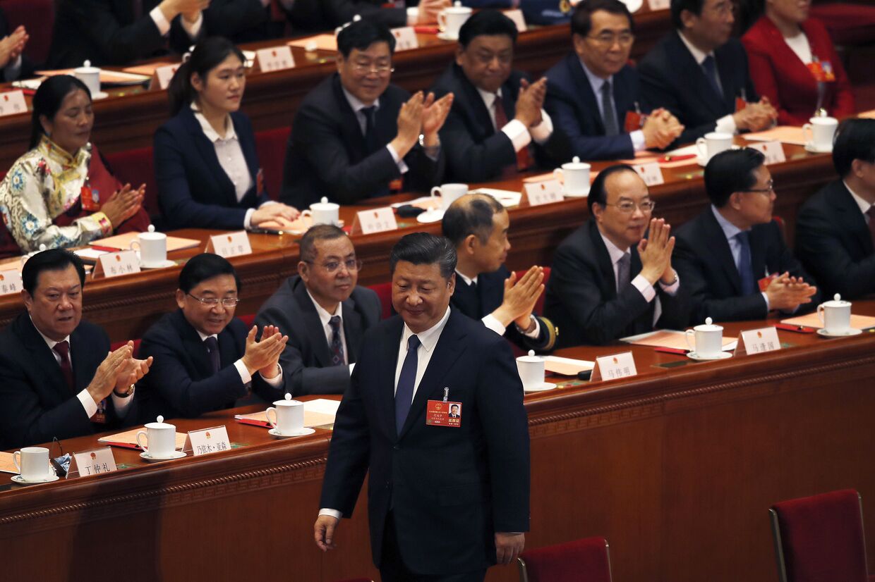 Председатель КНР Си Цзиньпин после голосования во время Всекитайского собрания народных представителей. 11 марта 2018