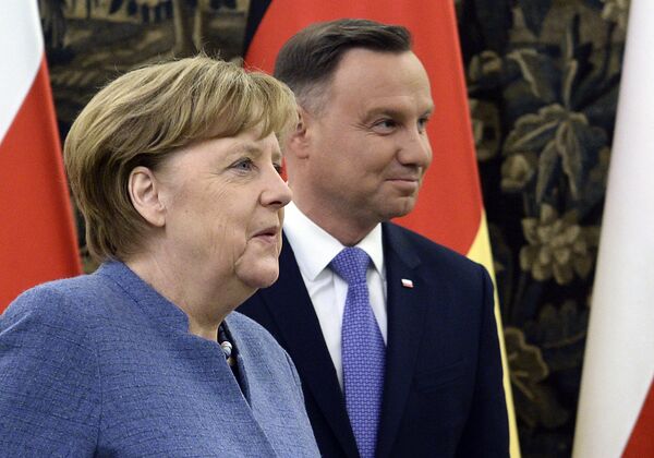 Канцлер Германии Ангела Меркель и президент Польши Анджей Дуда Канцлер Германии Ангела Меркель и президент Польши Анджей Дуда