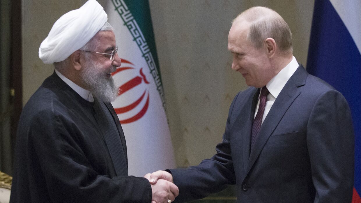 Президент РФ Владимир Путин и президент Исламской Республики Иран Хасан Рухани