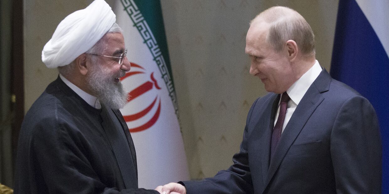 Президент РФ Владимир Путин и президент Исламской Республики Иран Хасан Рухани