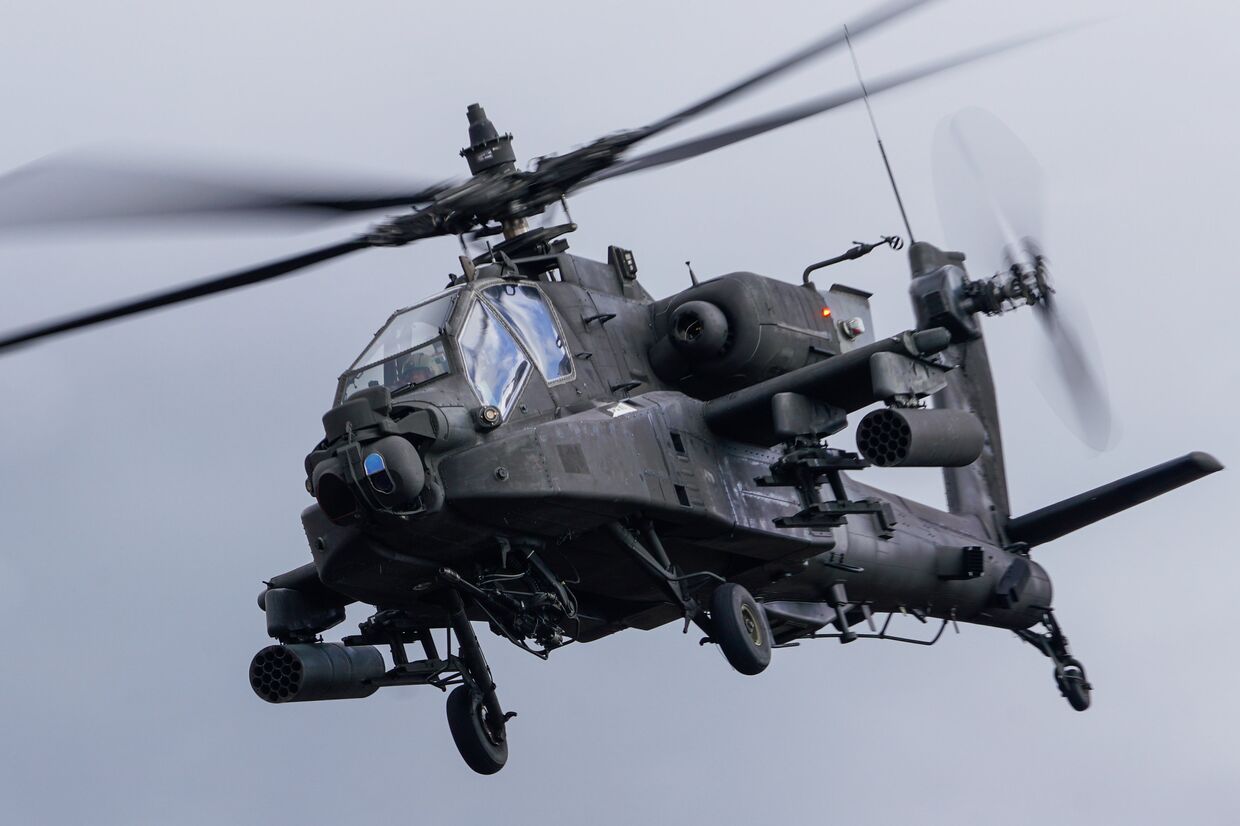Вертолет AH-64 Apache на международных военных учениях Summer Shield XIV в Латвии