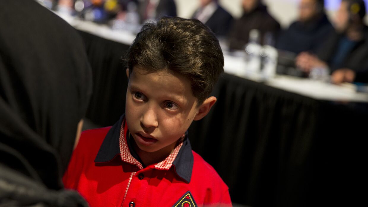 Сирийский мальчик Хасан Диаб на пресс-конференции по вопросу применения химического оружия в Сирии в Гааге. 26 апреля 2018