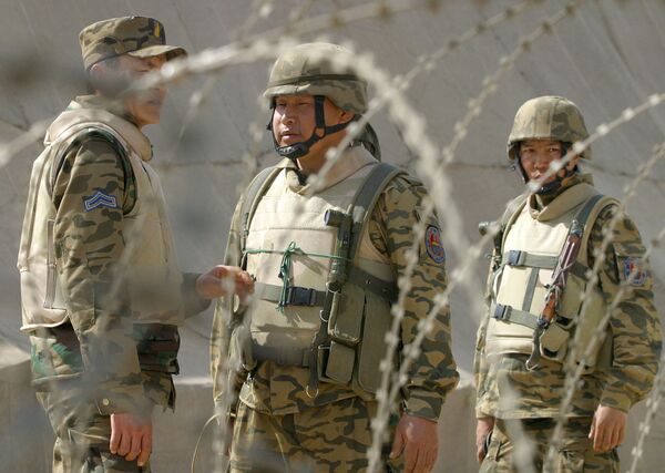 Монгольские солдаты на многонациональной военной базе в Хилле, Ирак