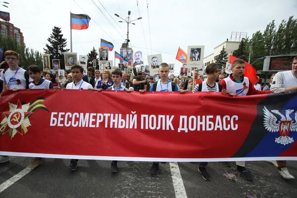 Участники акции Бессмертный полк в Донецке. 9 мая 2018 Участники акции Бессмертный полк в Донецке. 9 мая 2018