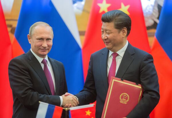 Президент России Владимир Путин и председатель Китайской Народной Республики (КНР) Си Цзиньпин Президент России Владимир Путин и председатель Китайской Народной Республики (КНР) Си Цзиньпин