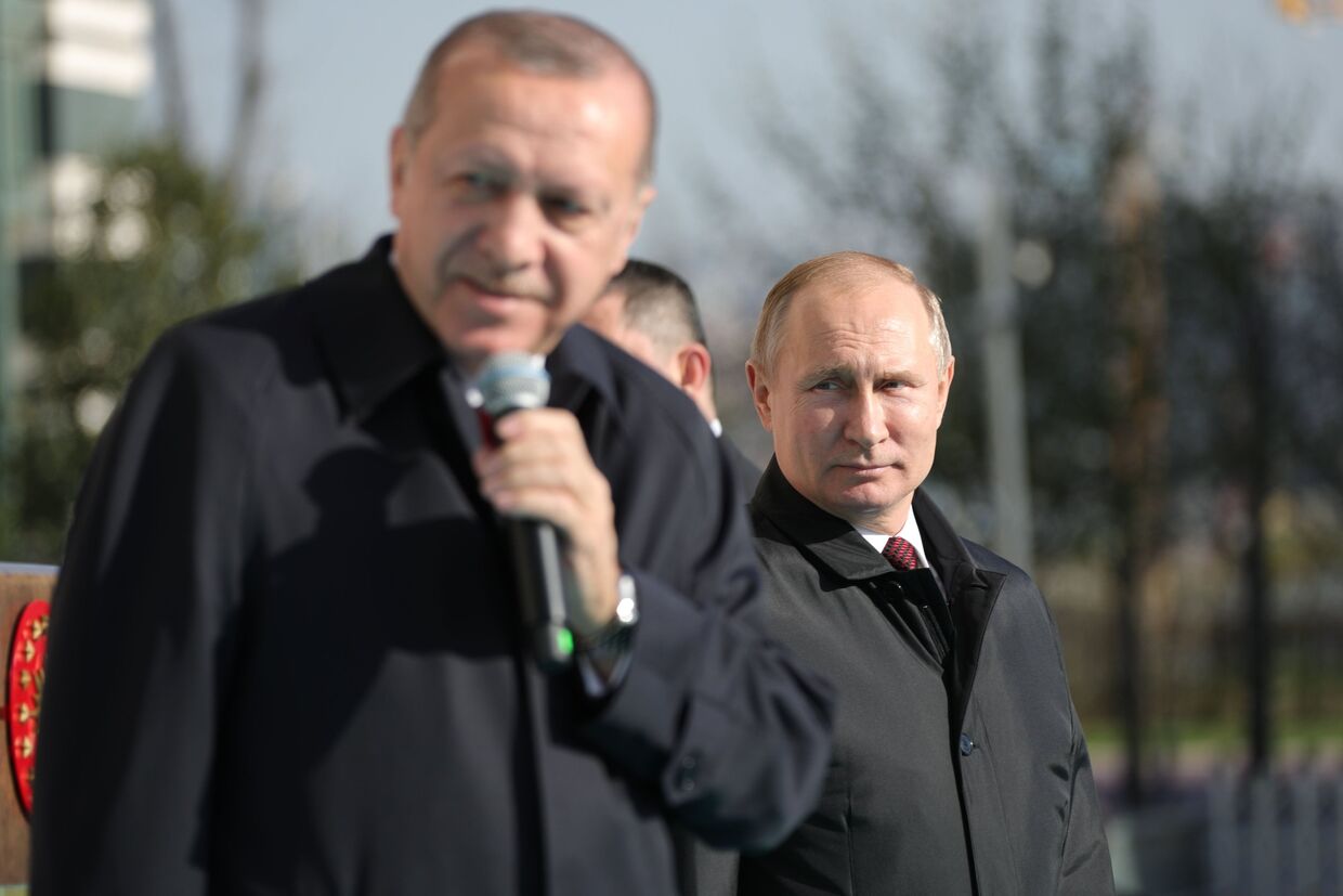 Президент Турции Реджеп Тайип Эрдоган и президент РФ Владимир Путин на церемонии запуска строительства первого энергоблока АЭС Аккую. 3 апреля 2018