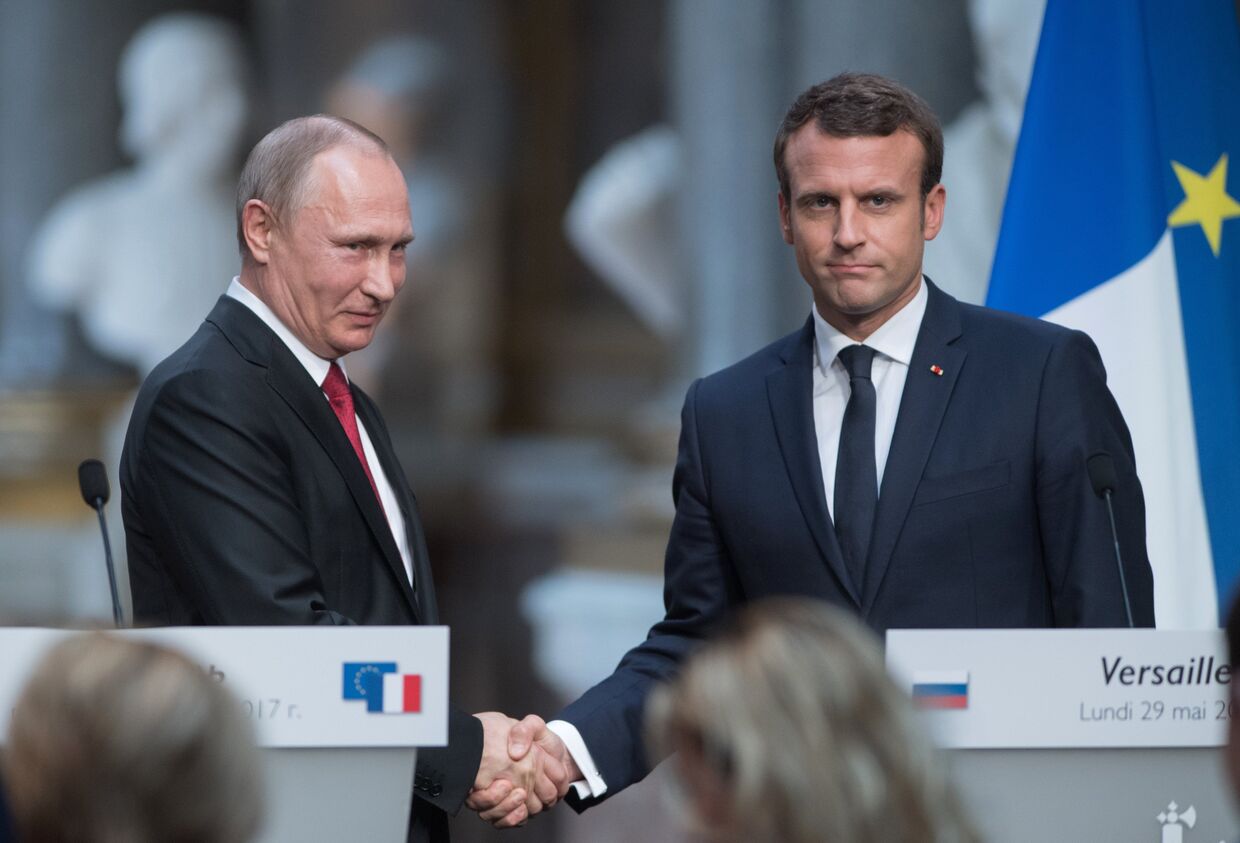 Владимир Путин и Эммануэль Макрон во время совместной пресс-конференции по итогам российско-французских переговоров в Версальском дворце. 29 мая 2017