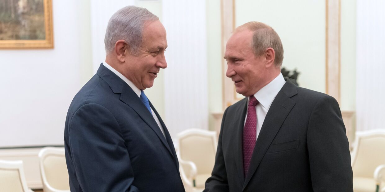 Владимир Путин и премьер-министр государства Израиль Биньямин Нетаньяху во время встречи. 11 июля 2018