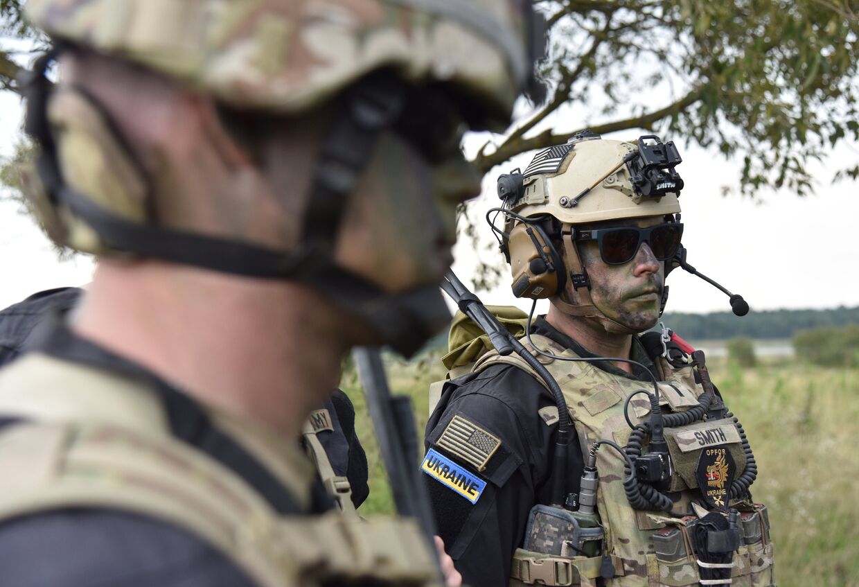 Военнослужащие вооруженных сил Украины и армейских подразделений иностранных государств во время активной фазы военных учений Репид Трайдент - 2018