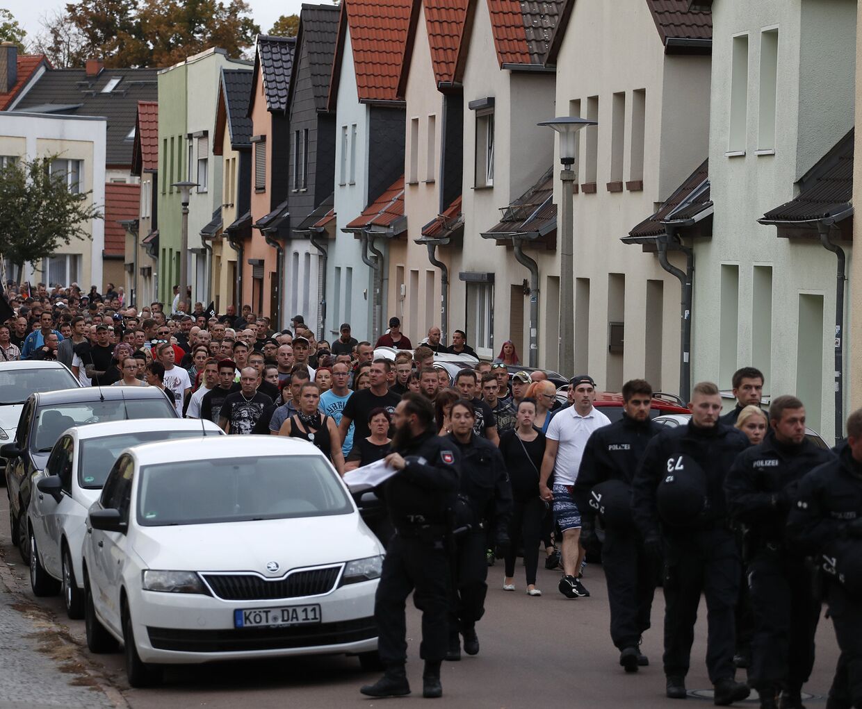Участники траурного марша в Кетене, Германия