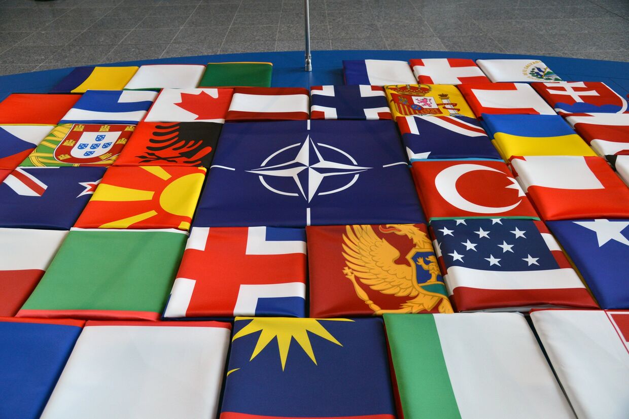 Флаги саммита стран-участниц НАТО в Брюсселе. 11 июля 2018
