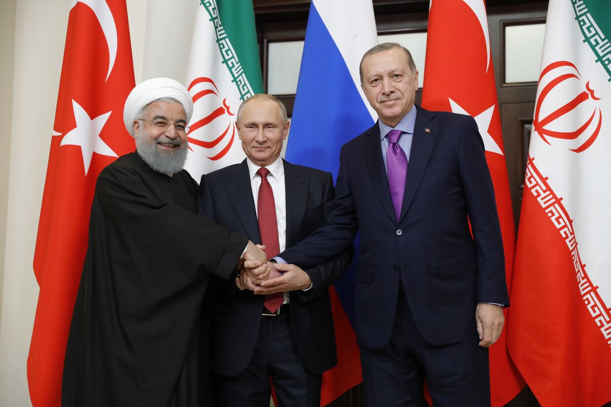 Владимир Путин, президент Ирана Хасан Рухани и президент Турции Реджеп Тайип Эрдоган во время встречи. 22 ноября 2017
