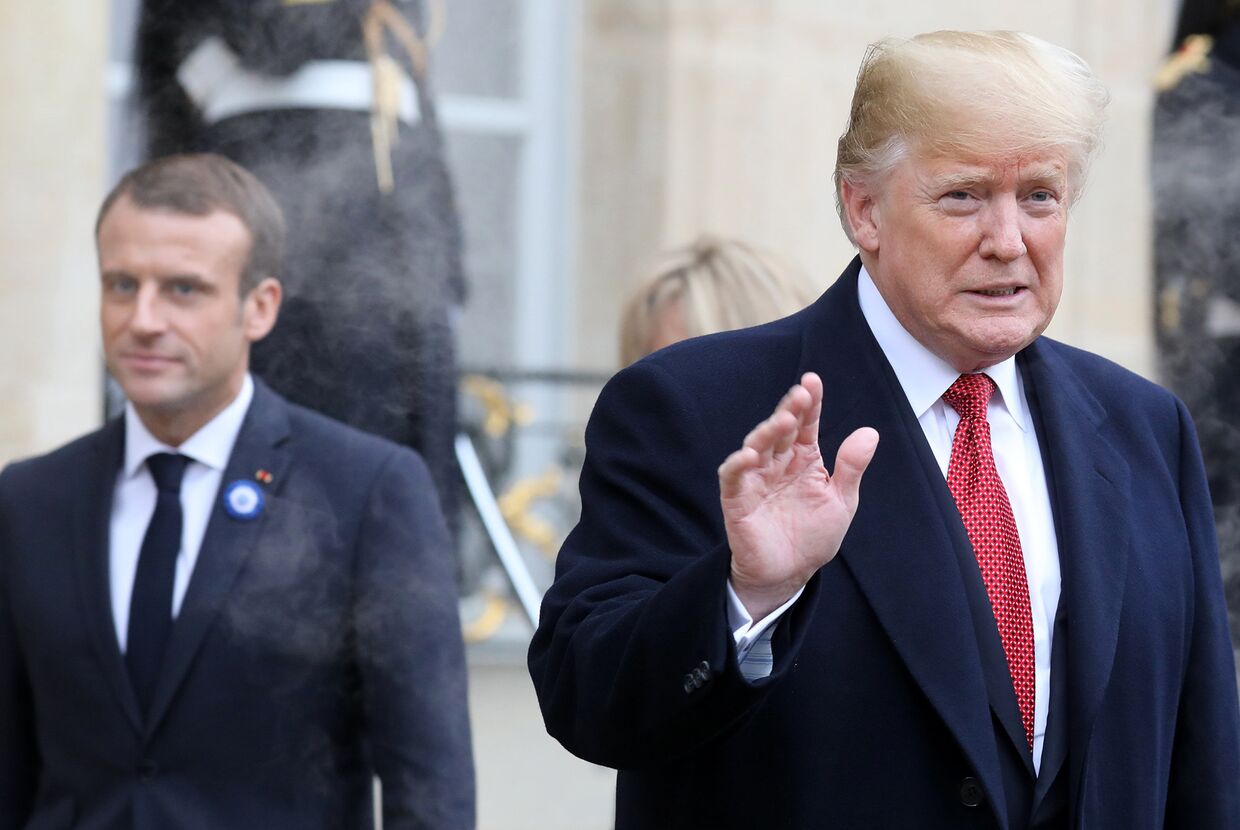 Президент США Дональд Трамп покидает Елисейский дворец в Париже