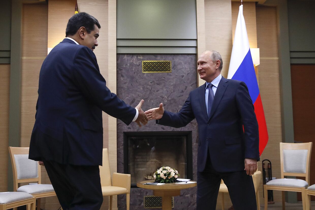 Президент РФ Владимир Путин и президент Венесуэлы Николас Мадуро во время встречи