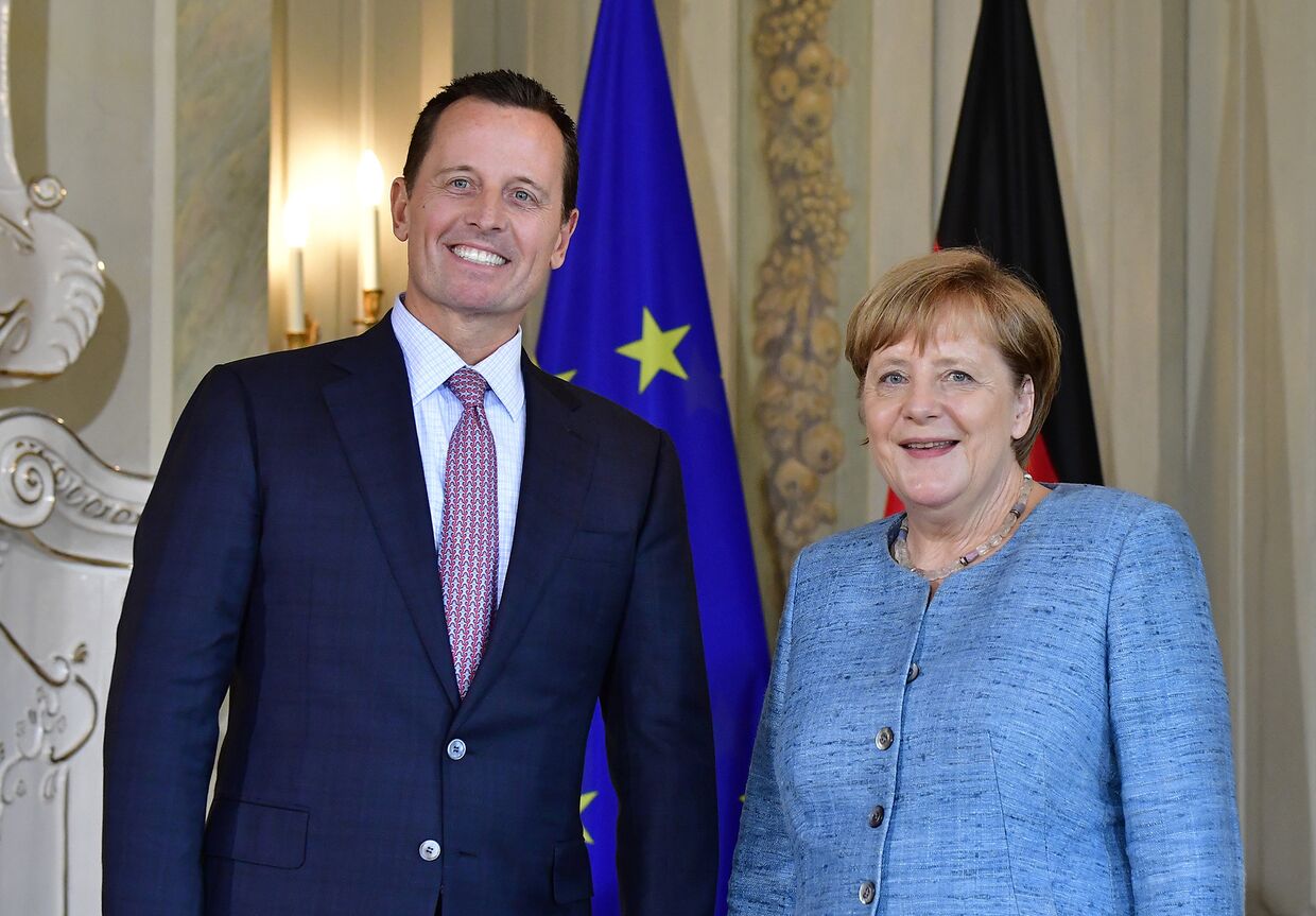 Канцлер Германии Ангела Меркель и посол США в Германии Ричард Гренелл