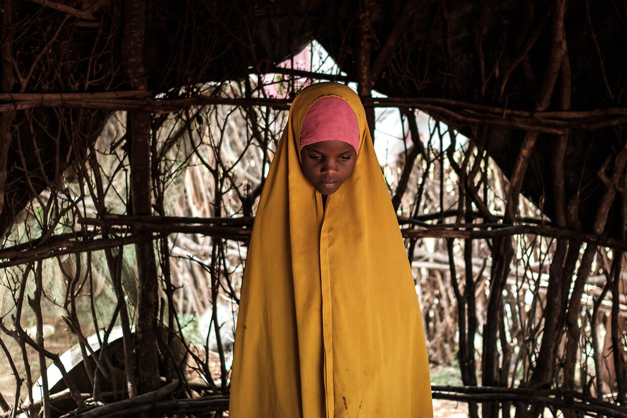 Девочка, беженец из Сомали в лагере для беженцев в Кении