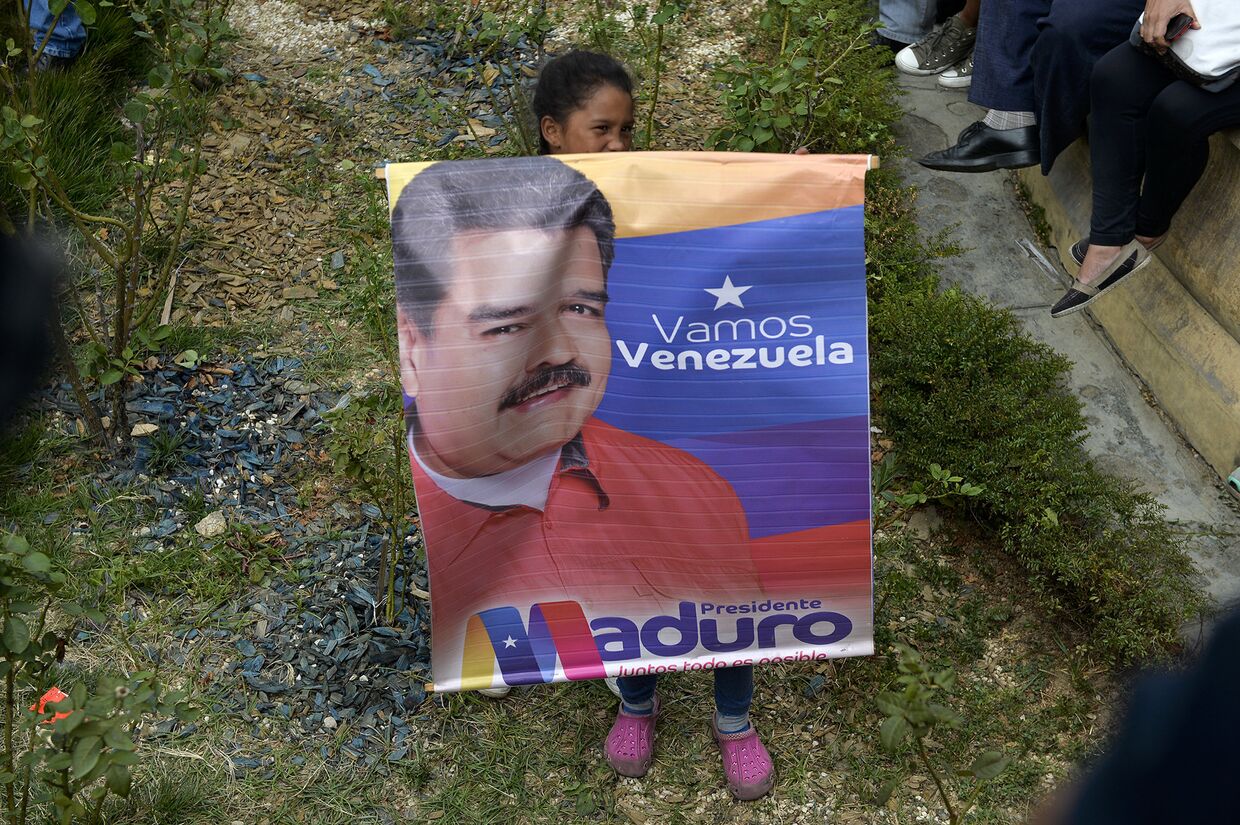 Сторонник президента Венесуэлы Николаса Мадуро