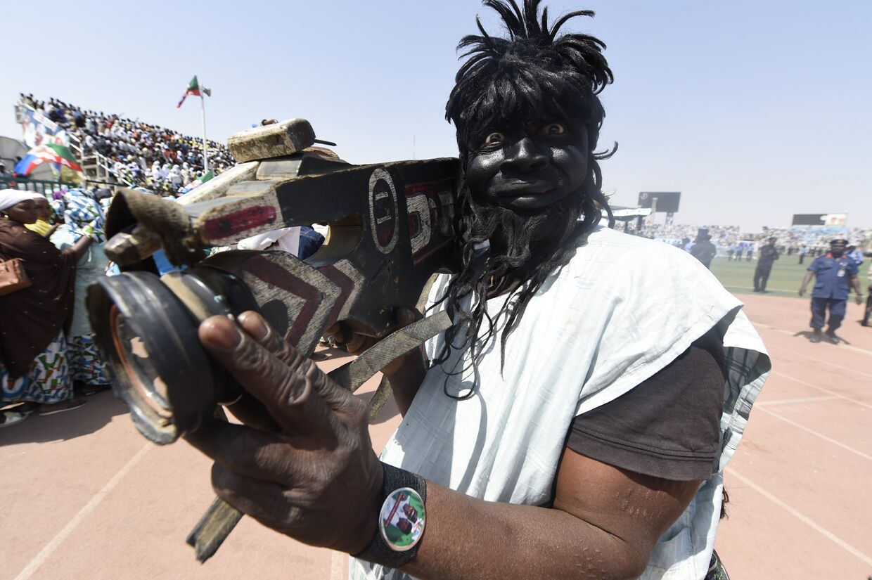 Житель Нигерии с камерой