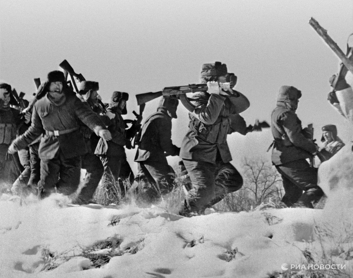 Chinese soldier hitting a Soviet comrade with an early Type 56. Credit RIA Novosti.