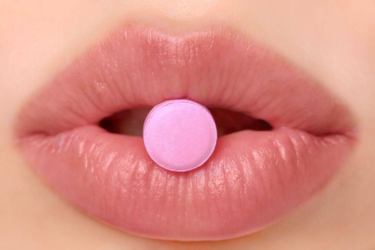 Розовые таблетки