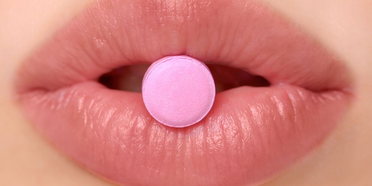 Розовые таблетки