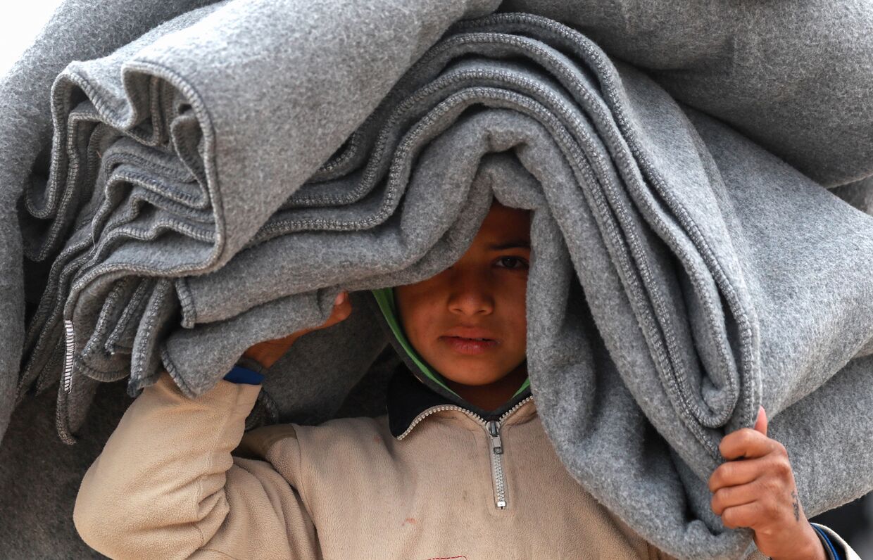 Сирийский мальчик в лагере для беженцев на северо-востоке Сирии