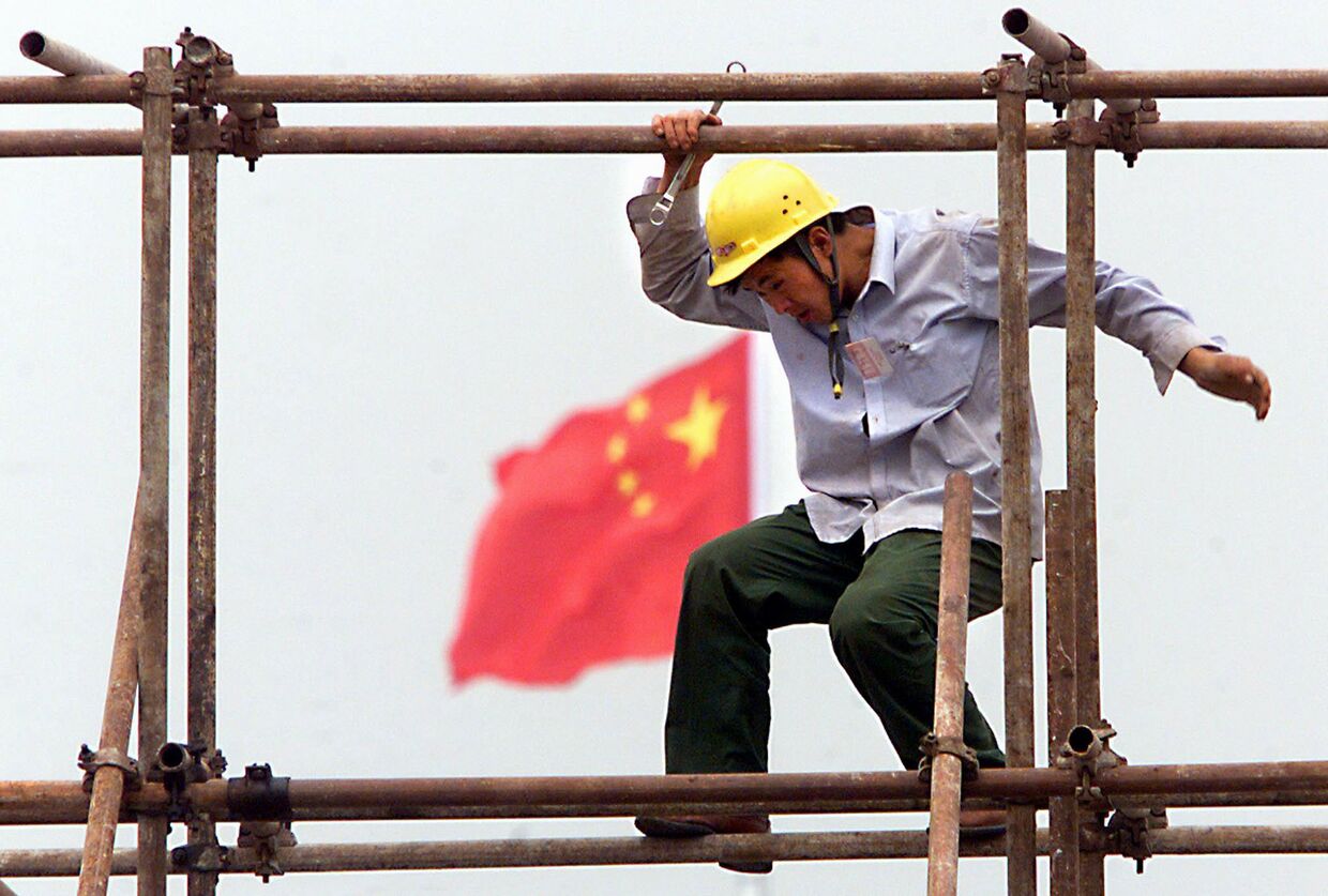 Рабочий на стройке в Пекине