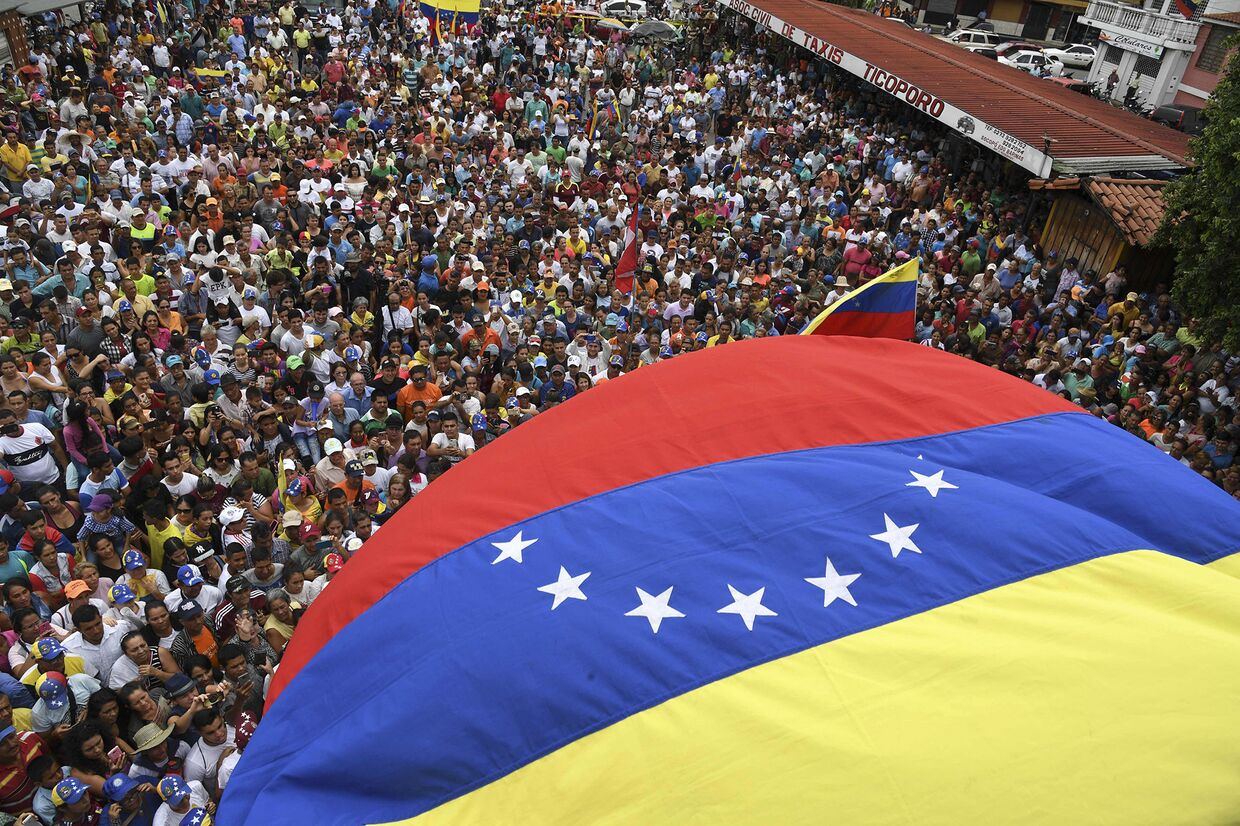 Сторонники лидера венесуэльской оппозиции Хуана Гуайдо на митинге в Сокопо, Венесуэла