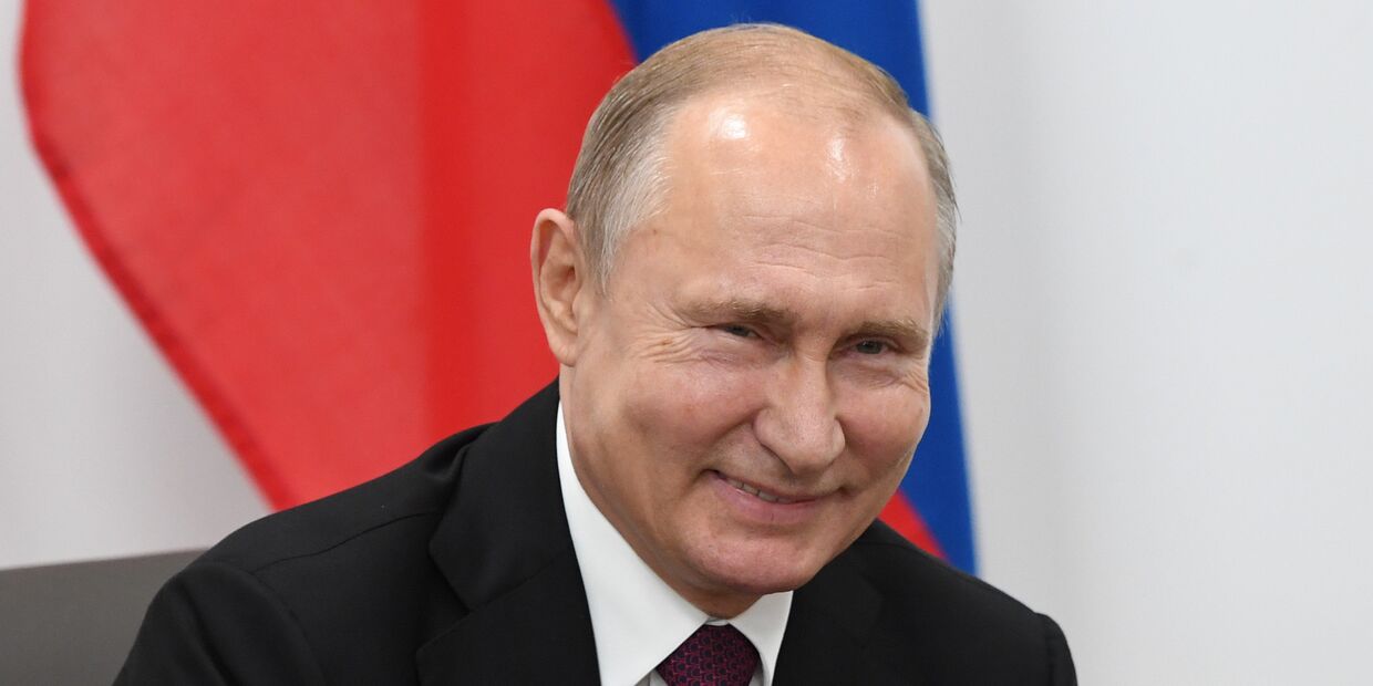 Рабочий визит президента РФ В. Путина в Японию для участия в саммите Группы двадцати