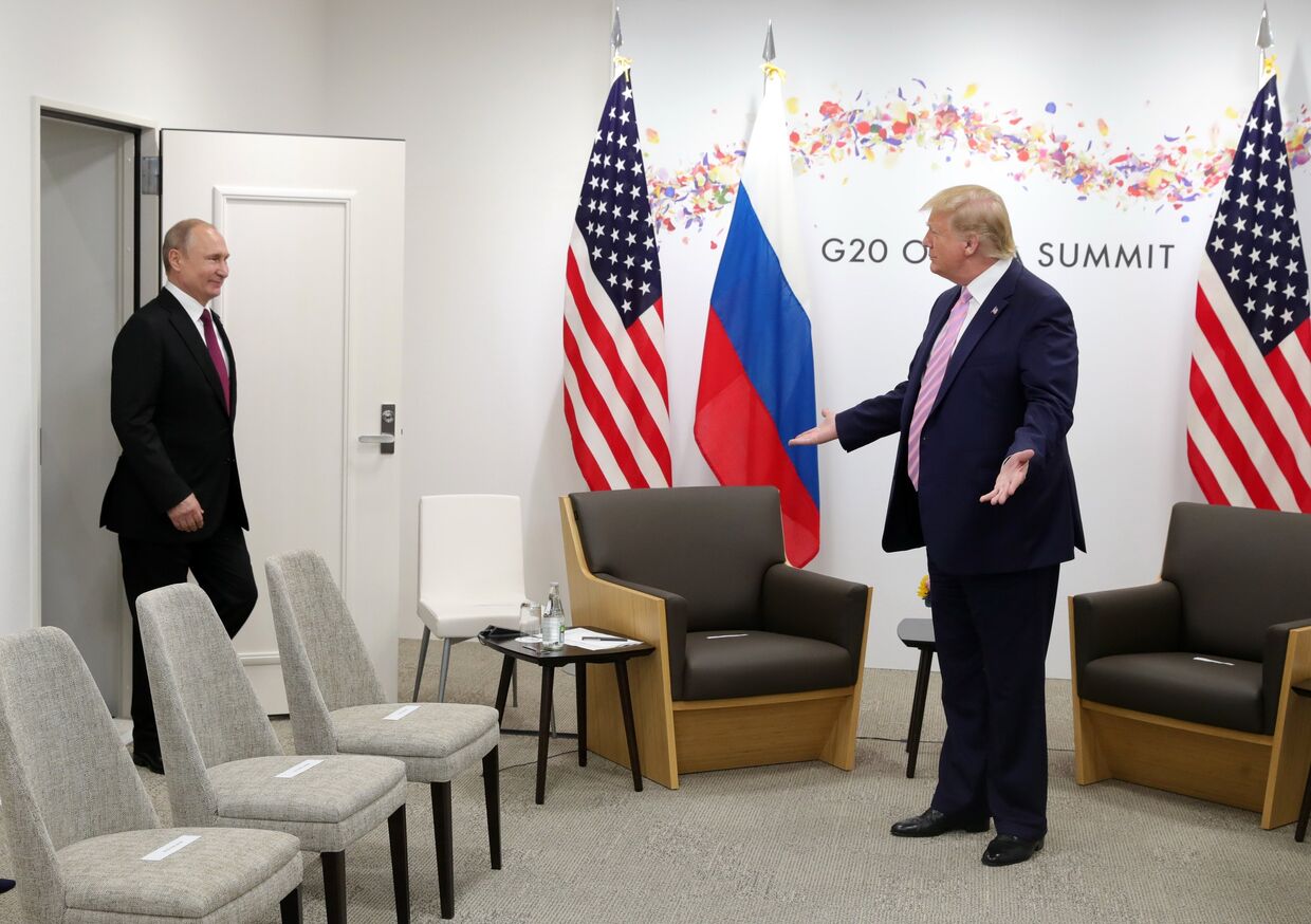 Президент РФ Владимир Путин и президент США Дональд Трамп на саммите Группы двадцати