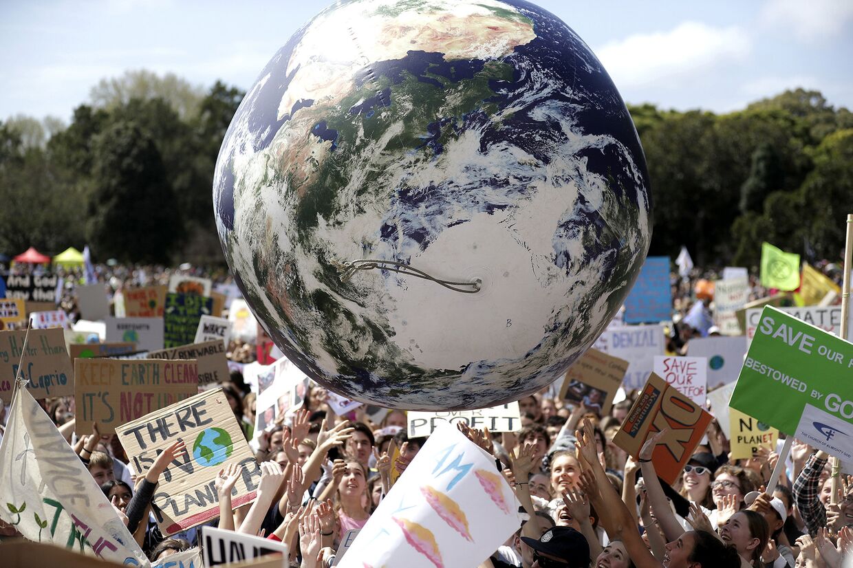 Участники акции протеста призывают к действиям по защите от изменения климата в Сиднее