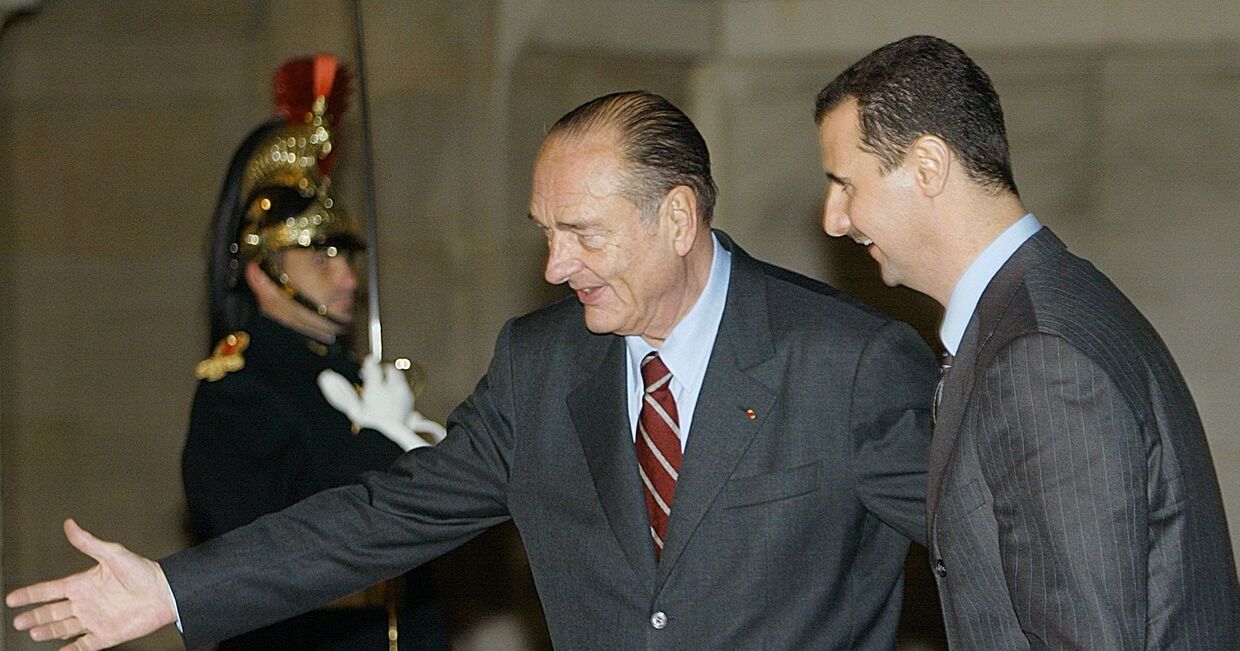Президент Франции Жак Ширак и президент Сирии Башар Асад во время встречи в Париже в 2002 году