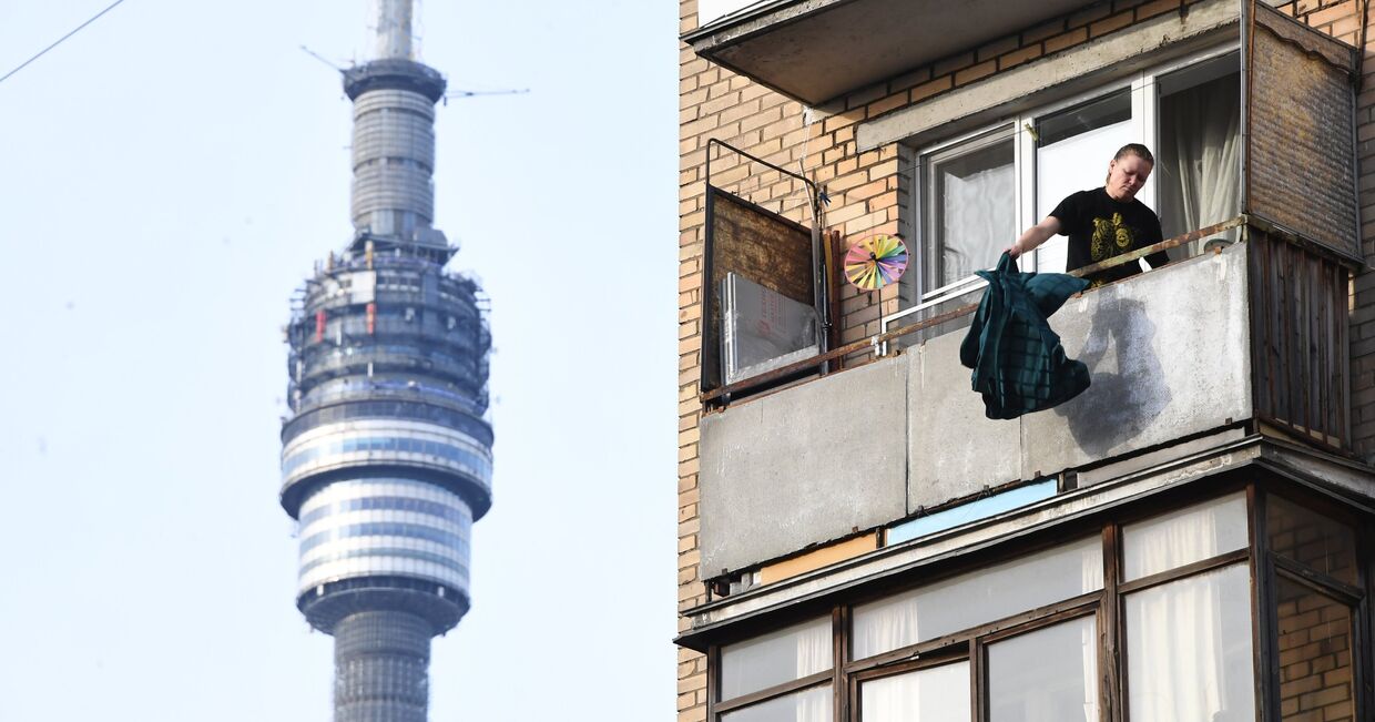 Женщина балконе жилого дома в Москве