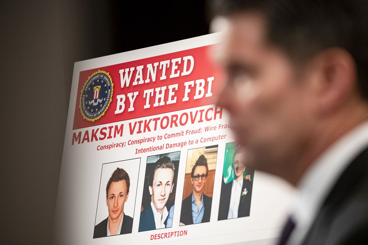 Максим Якубец на плакате розыска, распространенном ФБР в Вашингтоне